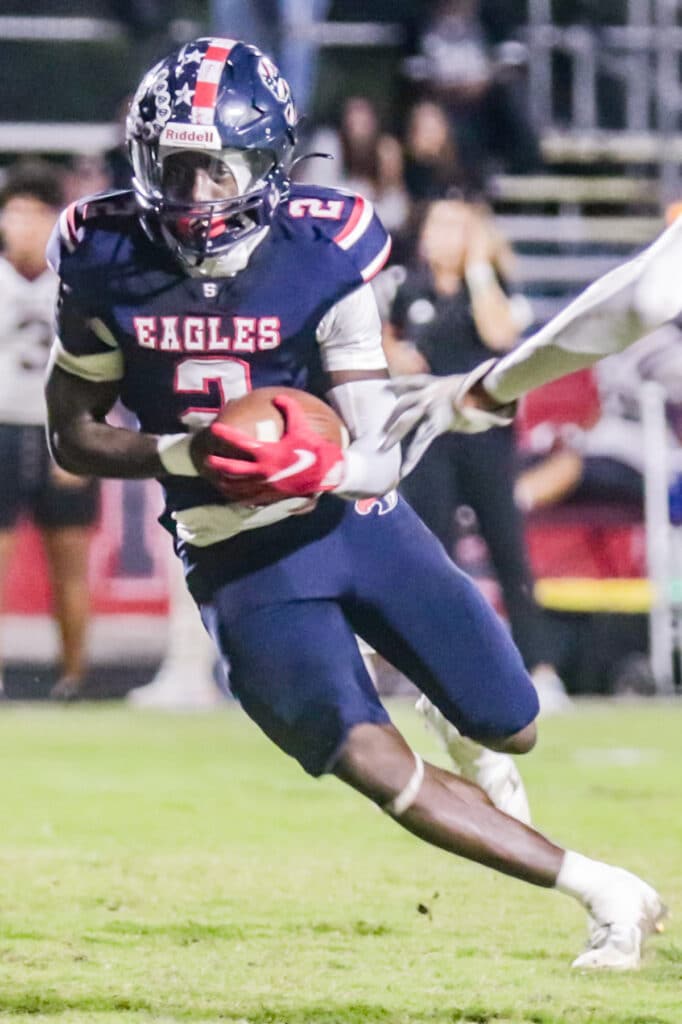 At the Stead Friday night Sept. 29, 2023 Varsity Football. Eagles take on Wiregrass Bulls, Eagle #2 Tyree Davis carries the ball down field. [Credit: Cheryl Clanton]