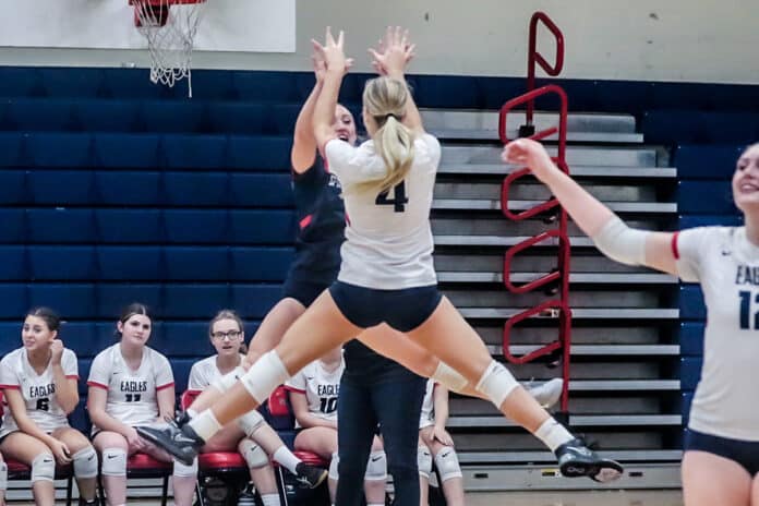 Eagles' #8 So. Aubrie Gelm and #4 So. Sylvia Hatfield celebrate a score against the Pinellas Park Patriots in the District Playoff Monday night Oct. 16, 2023. [Credit: Cheryl Clanton]