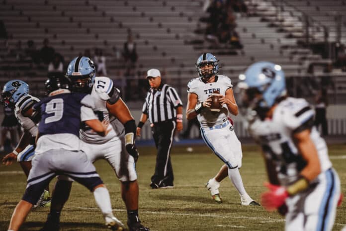 NCT vs Central 10/20/23- Sharks' QB, 5, Jackson Hoyt, looks for an open receiver. [Credit: Cynthia Leota]