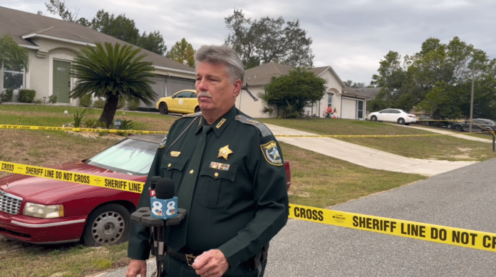 Sheriff Al Nienhuis speaks to reporters near the crime scene on Marquette Street in Spring Hill. Oct. 11, 2023. Credit: HCSO video