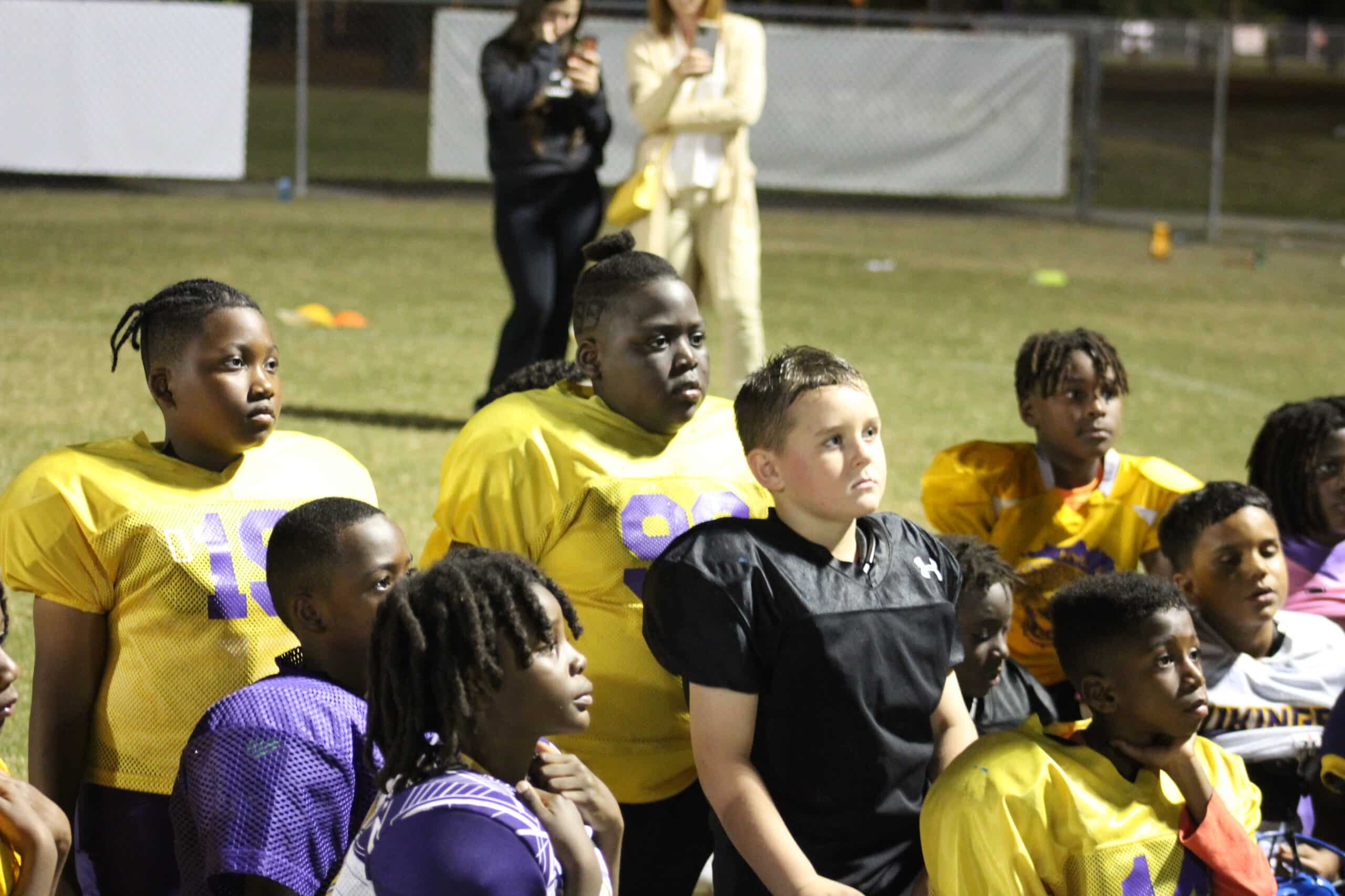 Tyrone Goodson inspires the HYL 8U football team before their big game on Saturday. [Credit: Rocco Maglio, 11/9/23]