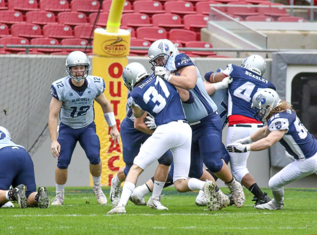 Nature Coast Technical High School Senior Michael Marotta blocks North’s player Chayce Bishop from Independence High School in Tennessee during the Blue-Grey All-American Bowl (Class of 2020) on January 4, 2020 at Raymond James Stadium home field for the Tampa Bay Buccaneers. [Credit: Alice Mary Herden]