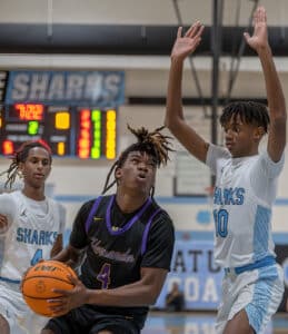 Hernando High's, 4, Leandre Wright looks to score defended by NCT ,10, Blake Johnson, Tuesday at NCT. Photo by Joe DiCristofalo