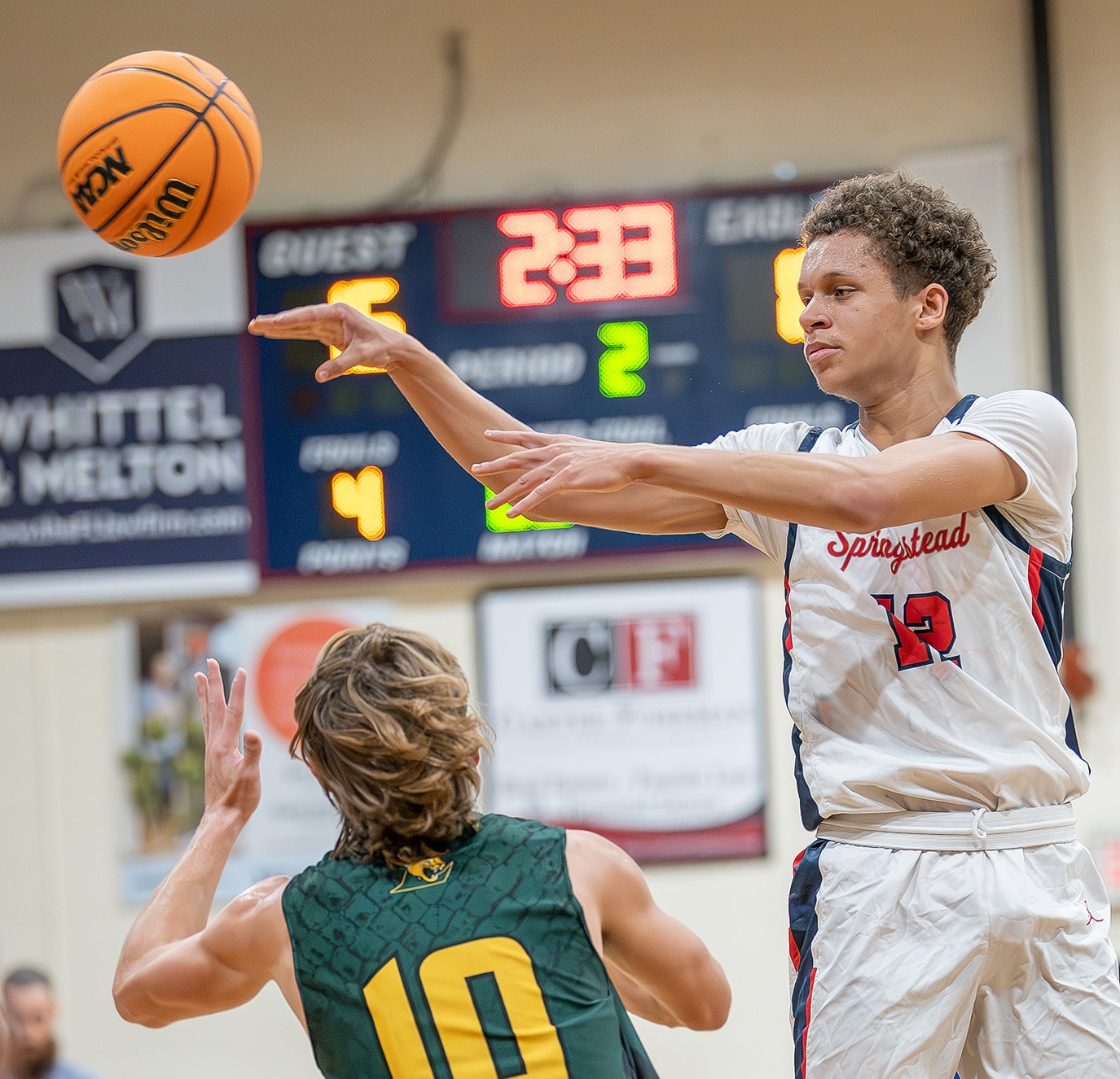 Springstead High's ,12, Austin Nicholson dishes a pass during Tuesday night’s match against visiting Lecanto High. Photo by Joe DiCristofalo