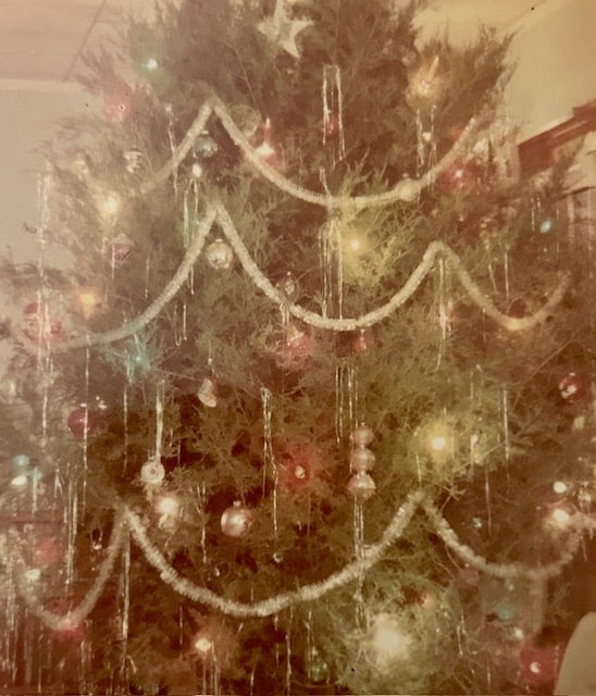 This is one of my favorite photos of a Christmas tree we had in the 1960s. The lights glowed and really sparkled! I recognize some ornaments that I still have today. [Provided by Judy Warnock]