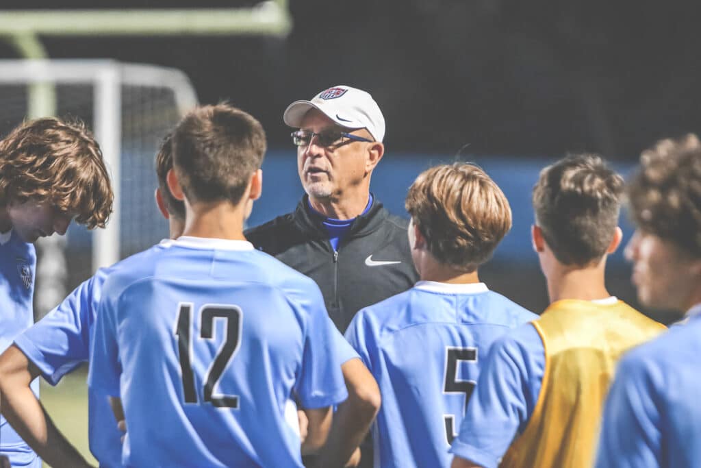 Nature Coast Tech boys soccer coach Sal Calabrese talks to his players before the matchup against Fivay in 2020. [Credit: Alice Mary Herden]