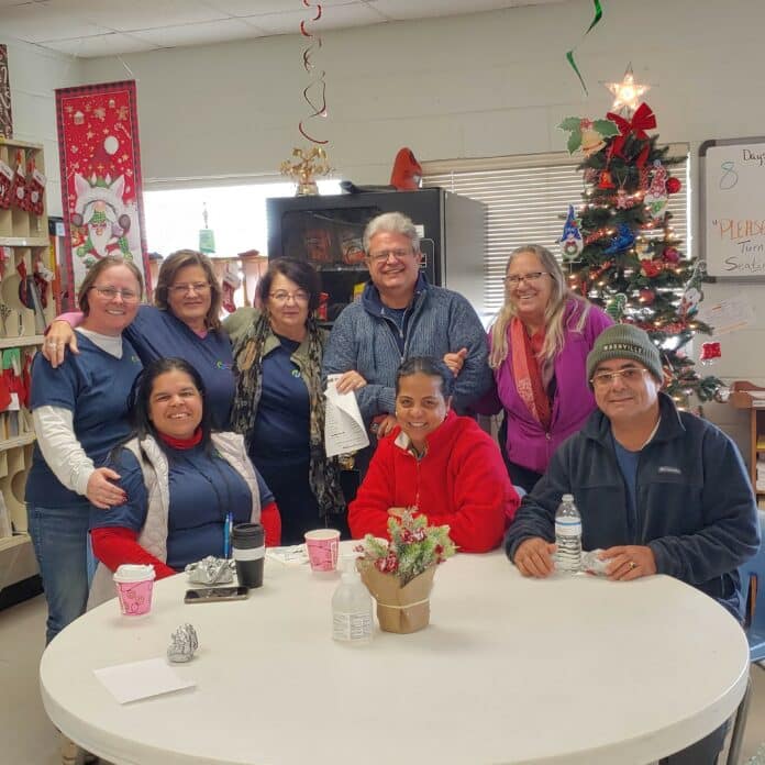 Back row from left to right: Paula Frank, Kimberly Howe, Maureen Finn, Greg Kojian, Laurie Dias Front row from left to right: Edna Ramos, Bety Rios, Lazaro I. Reyes. [Credit: Sarah Nachin]