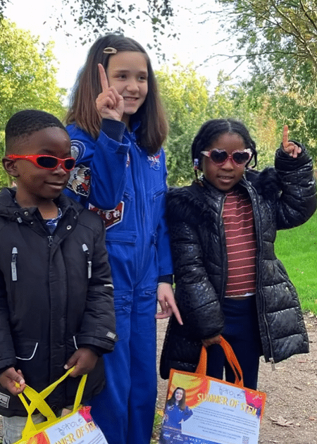 Astro Liz in action, motivating other kids to become involved in space science. Photo: Jennifer Norman