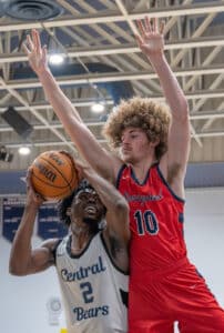 Central High, 2, Jeroen Watson tries to find a way past the defense by Springstead High, 10, Andrew Danchise Tuesday night at Central High. Photo by Joe DiCristofalo