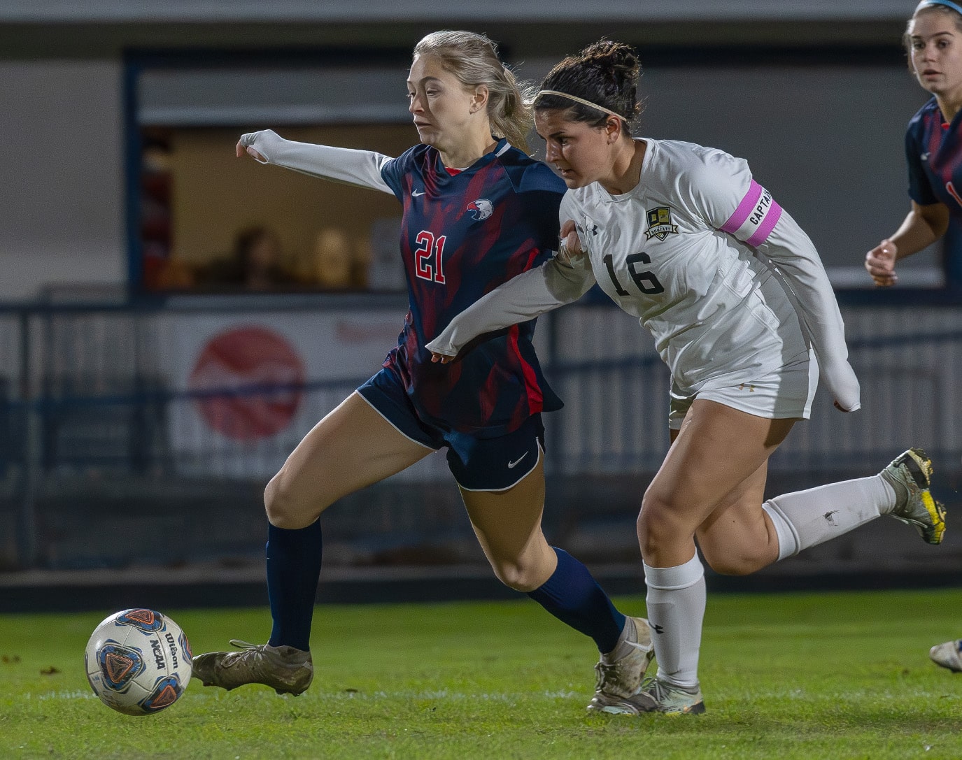 Springstead High, 21, Sarah Frazer works to get by Buchholz High defender, 16, Olivia Frazer in the 6A District 4 semi-final game in Spring Hill. [Photo by Joe DiCristofalo]