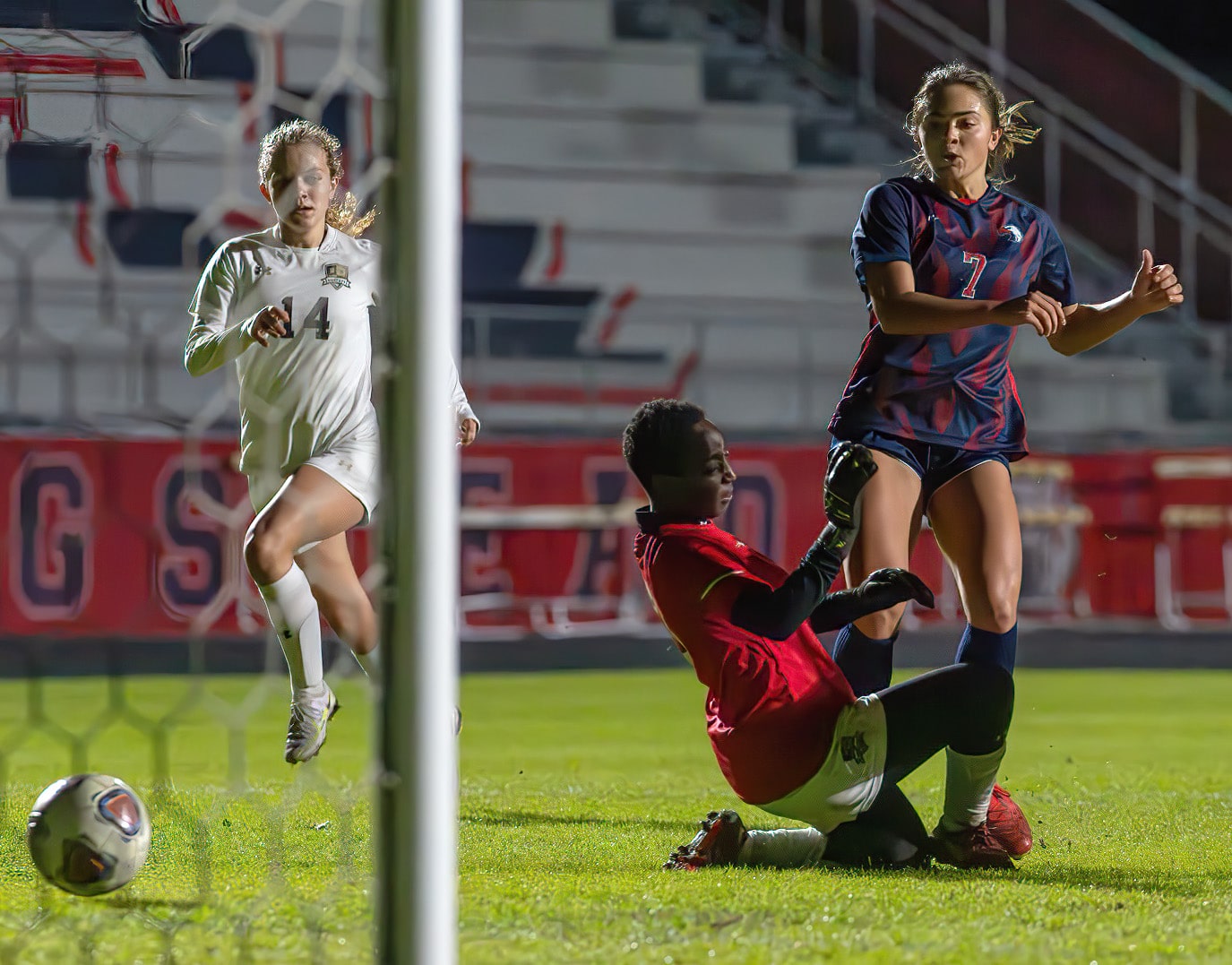Springstead High, 7, Ava Kanaar gets a shot past Buchholz High goalkeeper Mimi Fisher. Kanaar scored six times in the 8-0 Eagle win in the 6A District 4 semi-final game in Spring Hill. [Photo by Joe DiCristofalo]