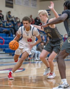 Springstead High's ,12, Austin Nicholson drives for the basket in the third-place game versus Mitchell High at the Glory Days Greg O’Connell Holiday Shootout. Photo by Joe DiCristofalo