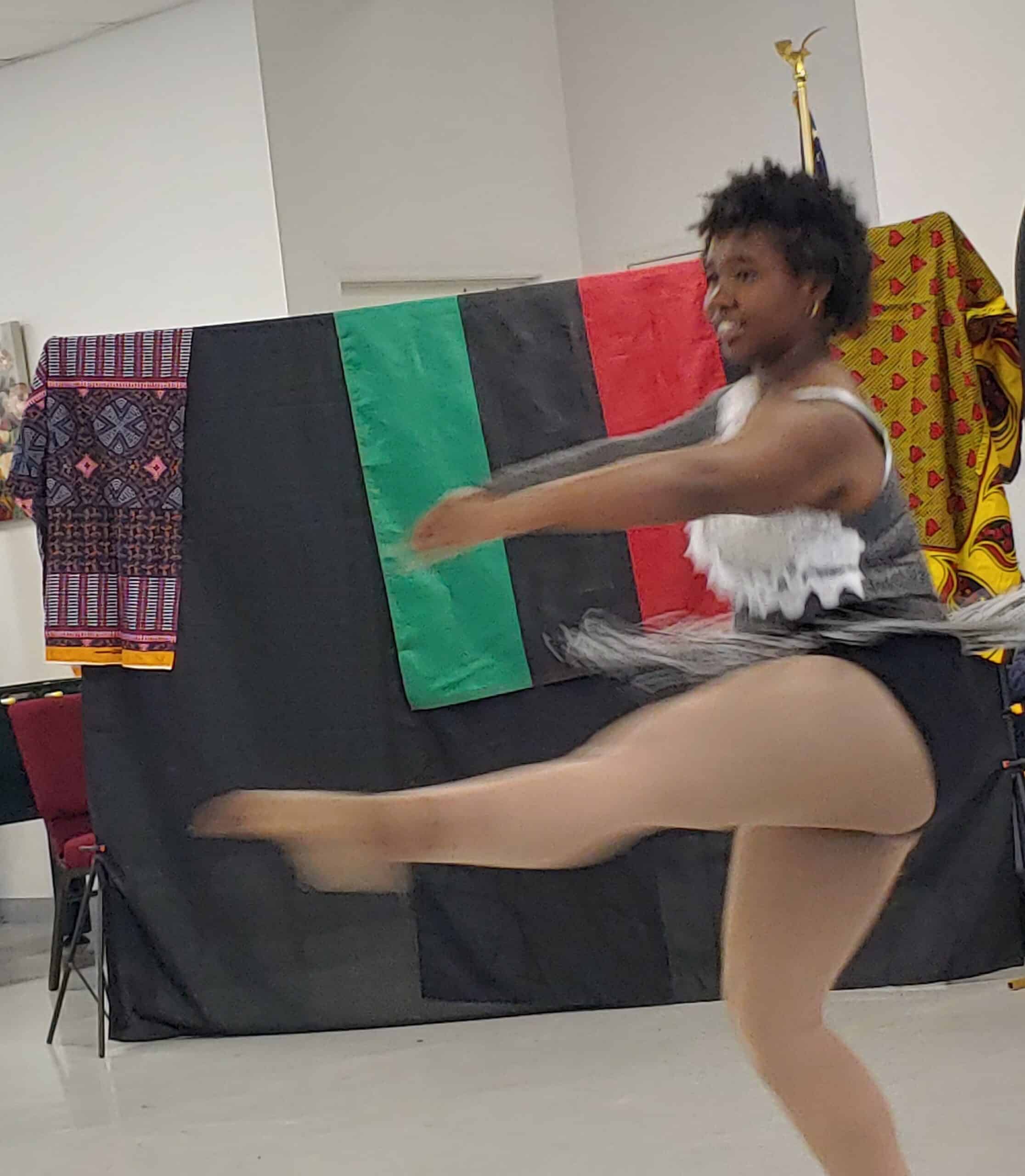 Calia Brown dancing at the Kwanzaa celebration. [Credit: Sarah Nachin]