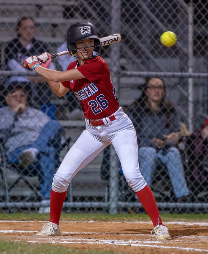 Springstead High, 26, Rachel Rivera eyes a high pitch Tuesday night in the game with visiting Weeki Wachee High. [Photo by Joe DiCristofalo]