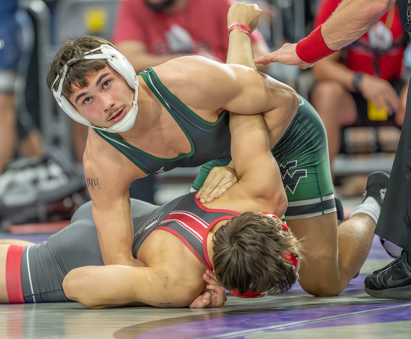 Weeki Wachee 144 pound Ricky Bowermeister beat Dostmukhammad Bakhtiyorov 14-1 in the first round of the FHSAA State Championships in Kissimmee . [Photo by Joe DiCristofalo]