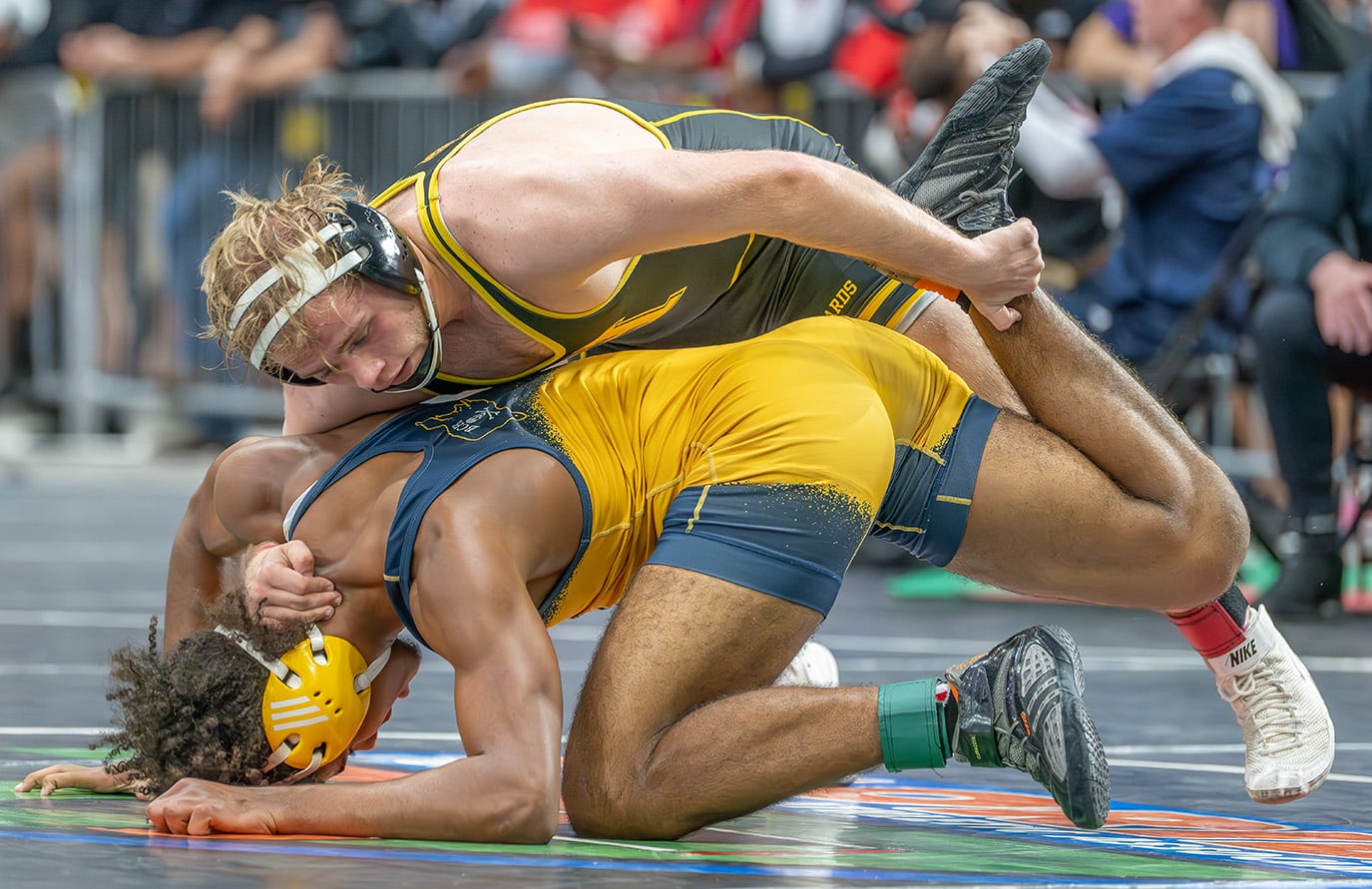 Hernando High 175 pound Morgan Johnston won over John Kelly from Boca Ciera 10-4 in the first round of the FHSAA State Championships in Kissimmee. [Photo by Joe DiCristofalo]