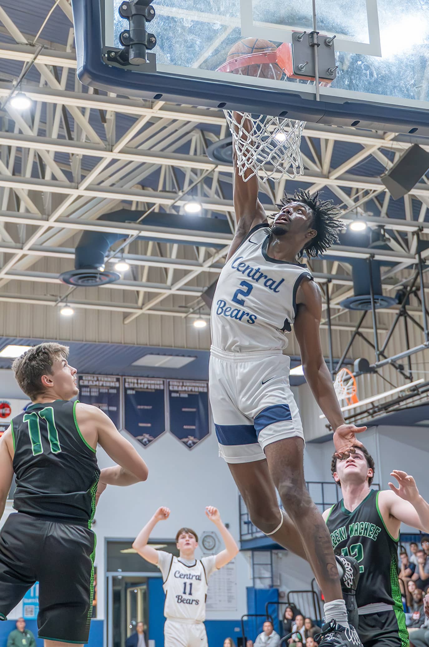 Central High, 2, Jerome “JD” Watson dunks the ball as the Bears pulled away to defeat Weeki Wachee in the 4A District 9 semifinal at Central High Thursday night. [Photo by Joe DiCristofalo]