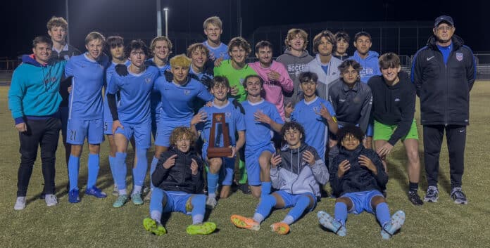 Nature Coast Tech poses with the 4A District 6 trophy after a 4-2 win over Weeki Wachee for the title. [Photo by Joe DiCristofalo]