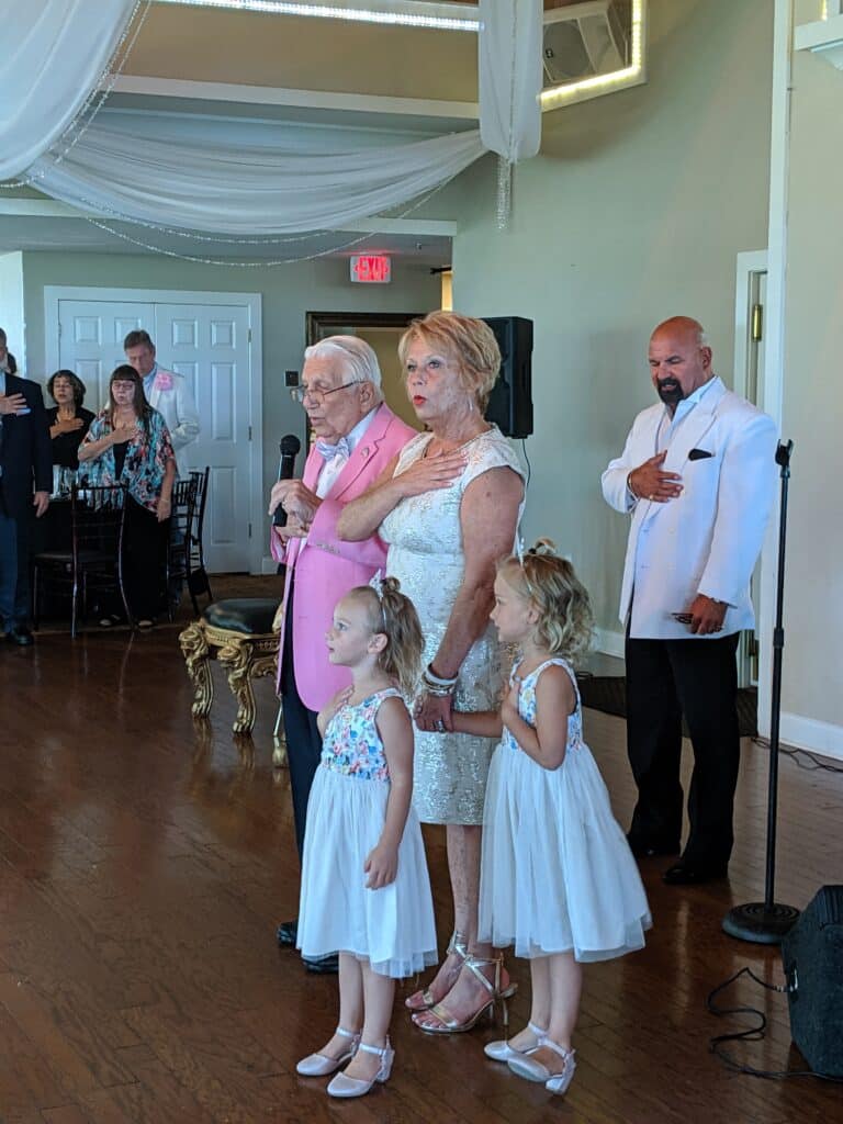 Col. Nick Morana and Debbie Druzbick with her granddaughters at the Enrichment Centers Senior Prom in 2019.