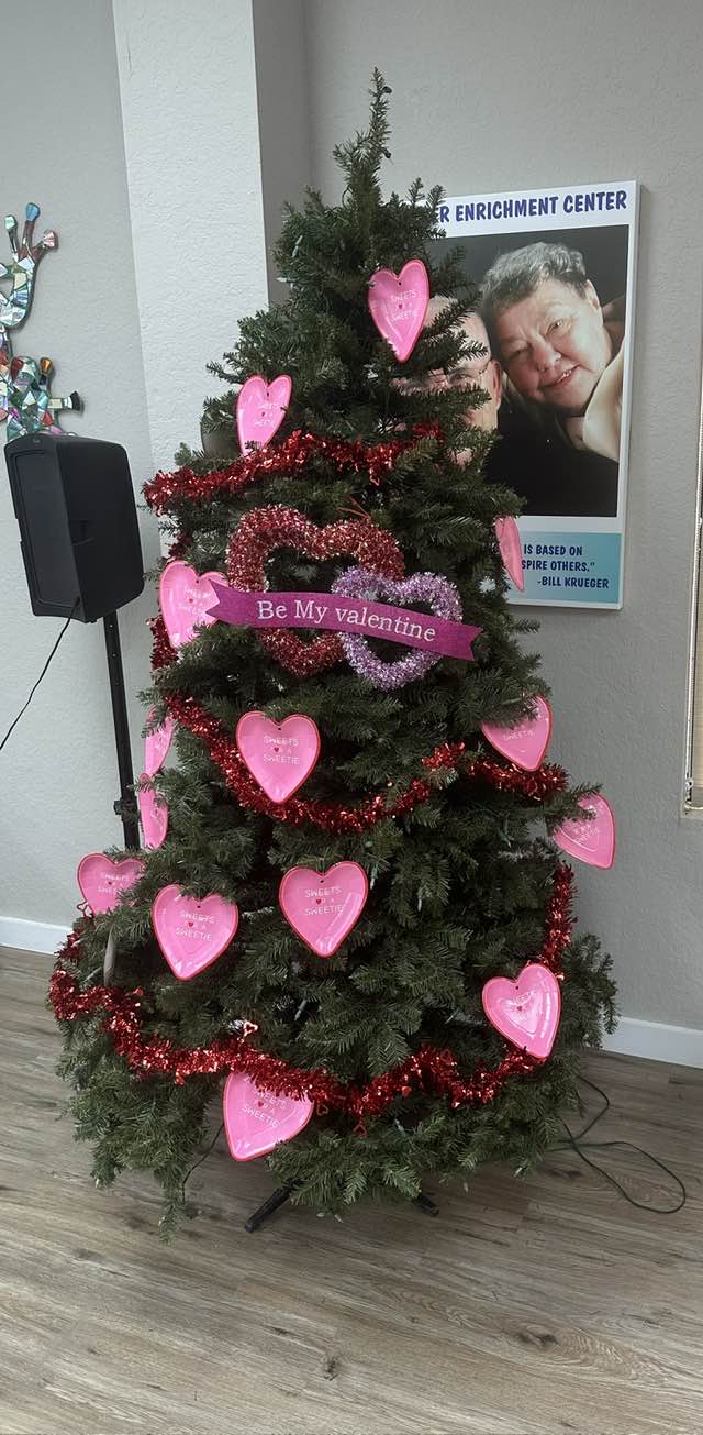 The Valentine's Tree at Krueger Enrichment Center, posted next to a photo of Bill and Ody Krueger. [Provided by Keith Krueger.]