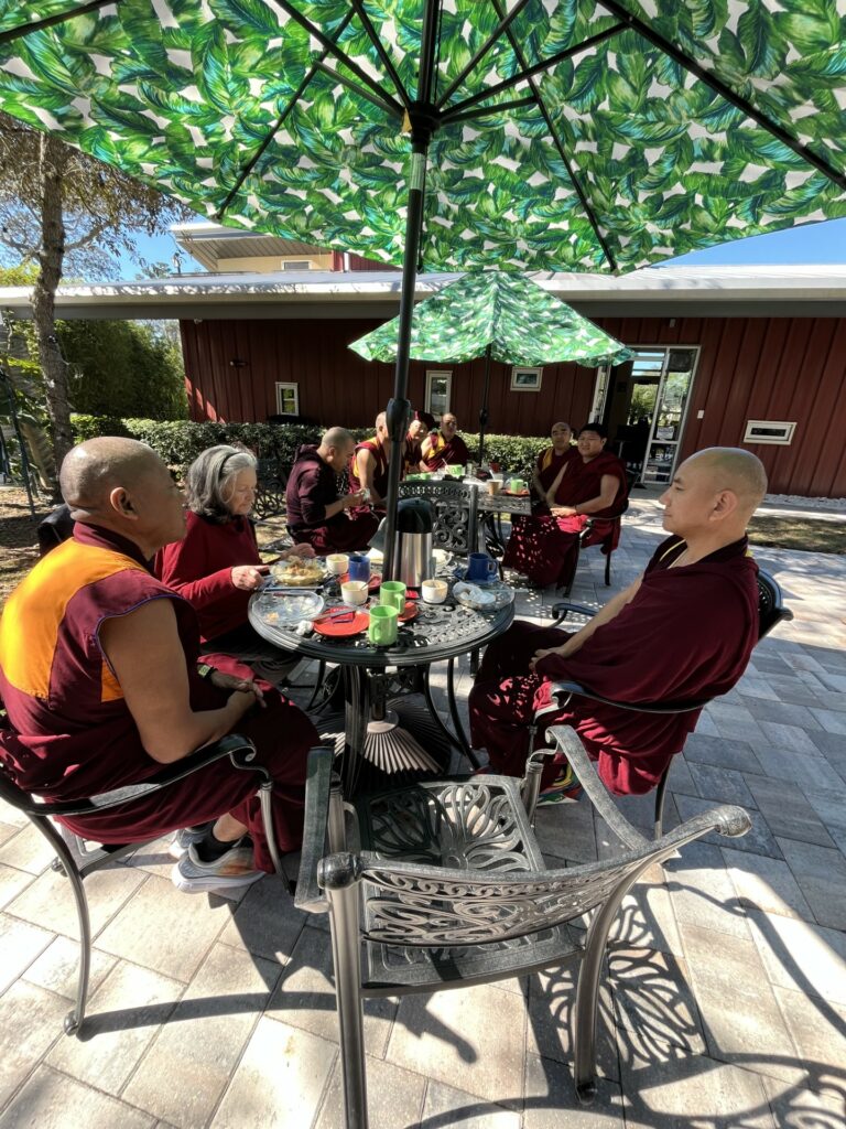 Monks from the Drepung Gomang Monastery gather for lunch at the cafe in the WellCome Om Center Tuesday, Jan. 30, 2024.