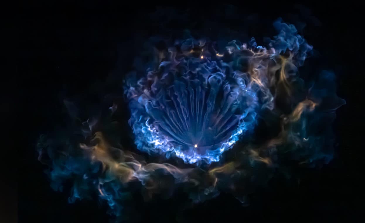 High-altitude gasses create a beautiful display in the night sky following stage separation. Photo: Richard Gallagher/FMN