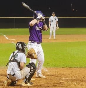 Hernando Senior Carter Caraynoff, 9, prepares to hit the ball at the plate. [Photo by Austyn Szempruch]