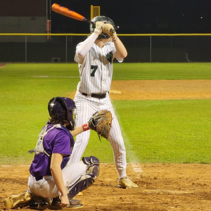 Weeki Wachee Junior Jacob Barnum, 7, readies himself for an at-bat. [Photo by Austyn Szempruch]