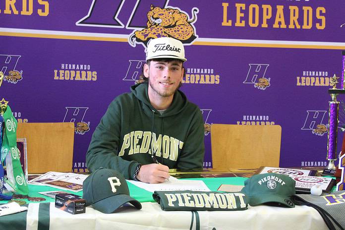 Senior Connor Fahey Signs to play for Piedmont University on Tuesday morning, March 19. [Credit: A. Szempruch]