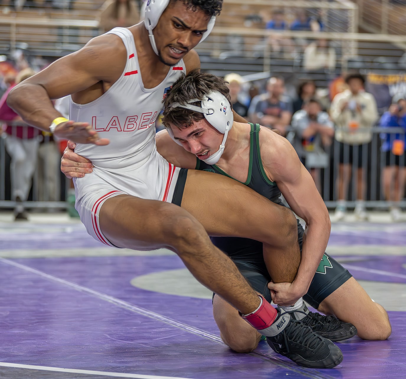  Weeki Wachee 144 pound Ricky Bowamaster needs overtime to get by Devon Jackson from LaBelle 5-3 at the FHSAA wrestling championships in Kissimmee. [Photo by Joe DiCristofalo]