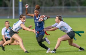 Central High, 3, Rayven Bess-Marshall gets stopped by Nature Coast Tech ,19, Dakota DeFrancesco and, 10, Lucia Mejia Wednesday evening at Central High. [Photo by Joseph DiCristofalo]