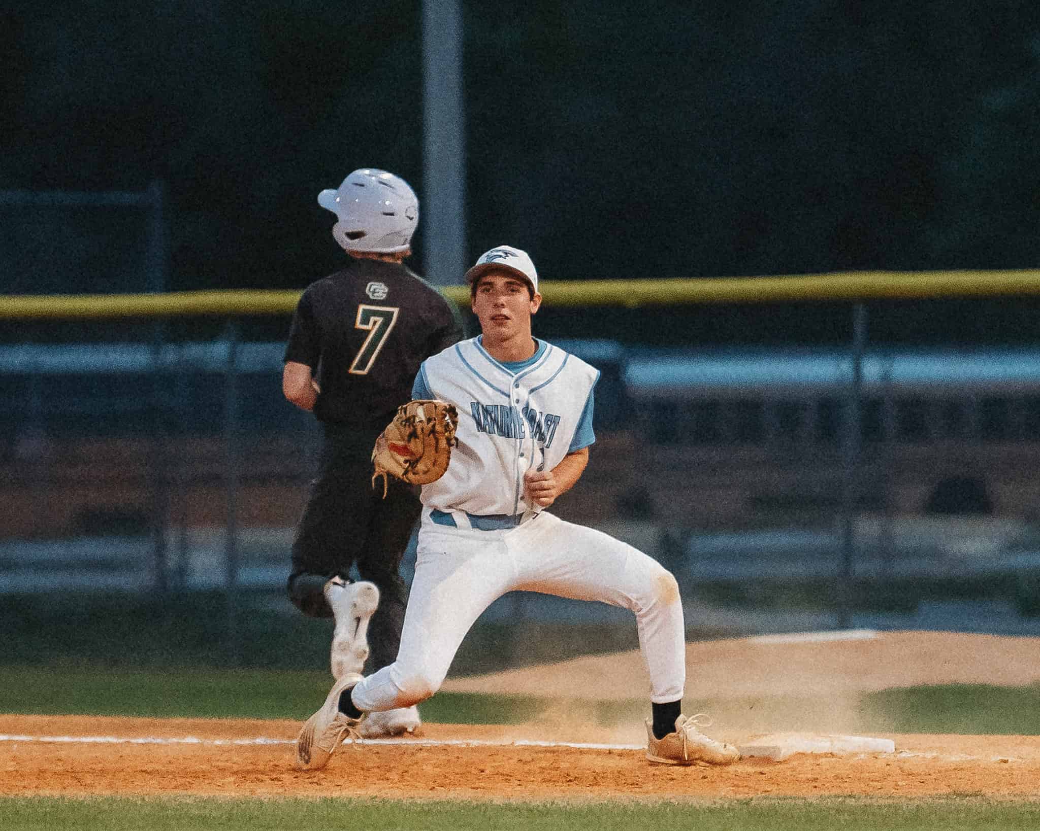 Joseph Rozsa of Nature Coast gets player out at first base. [Photo by Cynthia Leota]