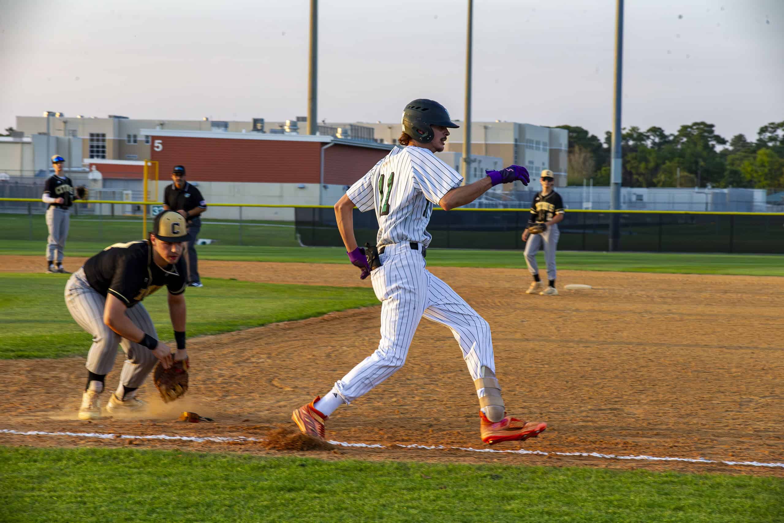 Weeki Wachee's Jase Kelly running for first base. [Photo by Hanna Maglio]