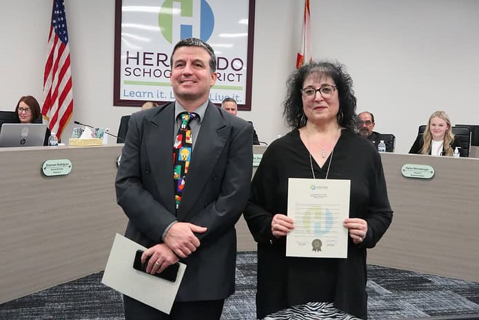 Rocco Maglio, Co-Publisher of Hernando Sun and Jodi Pushkin, Tampa Bay Times Newspaper in Education Manager accept the NIE Week proclamation. [Credit: HCSD]
