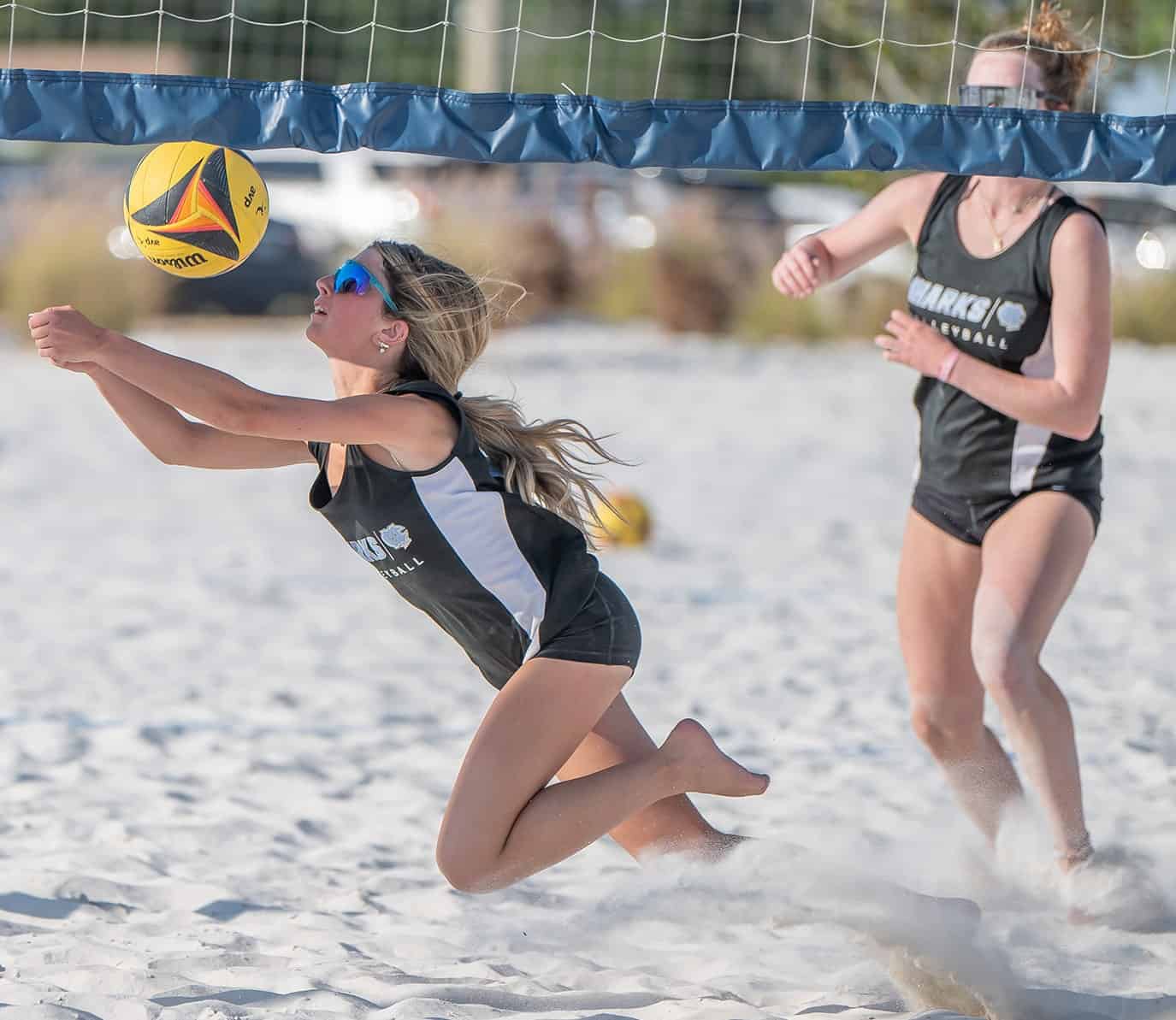 Nature Coast Tech, Ada Harmon dives to save a volley in a match with Weeki Wachee High during the 1A District 16 quarterfinals held at Bishop McLaughlin High School. Photo by [Joseph DiCristofalo]