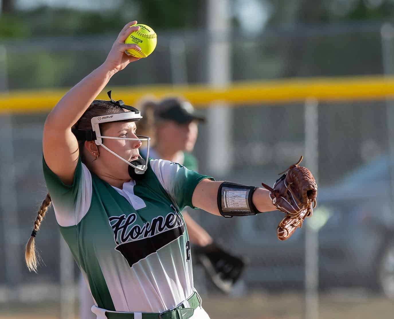 Weeki Wachee High’s Bre Slater winds into a delivery in the home 4A District 5 playoff game against Central High . Photo by [Joseph Dicristofalo]