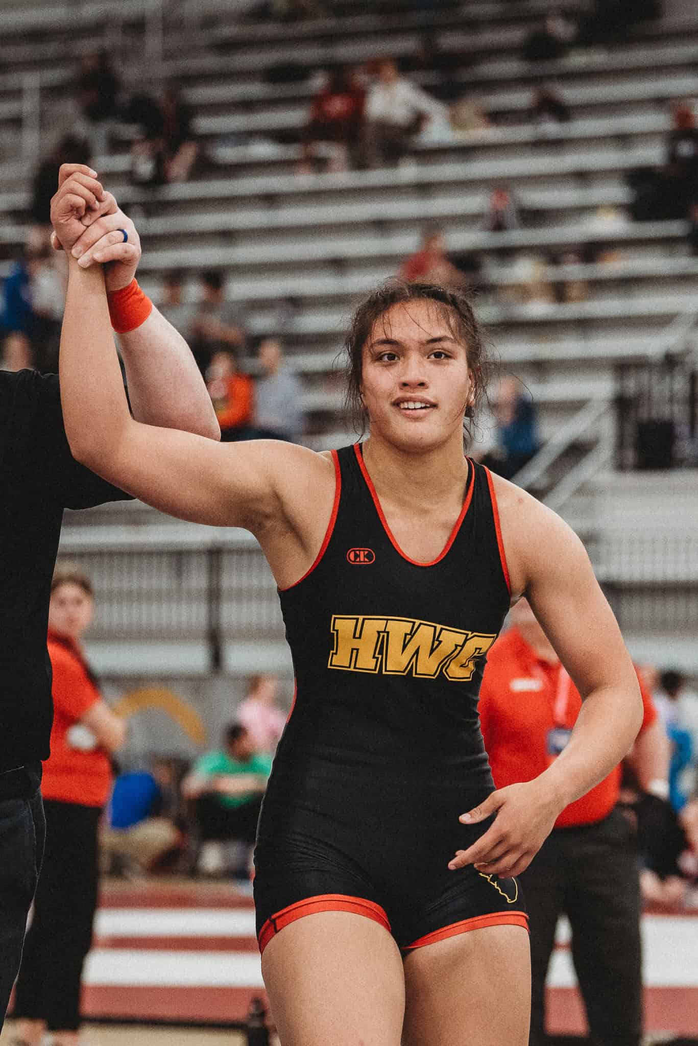 Grace Leota gets her hand raised in the U20 division at Women's Nationals in Spokane, WA. [Photo by Cynthia Leota]