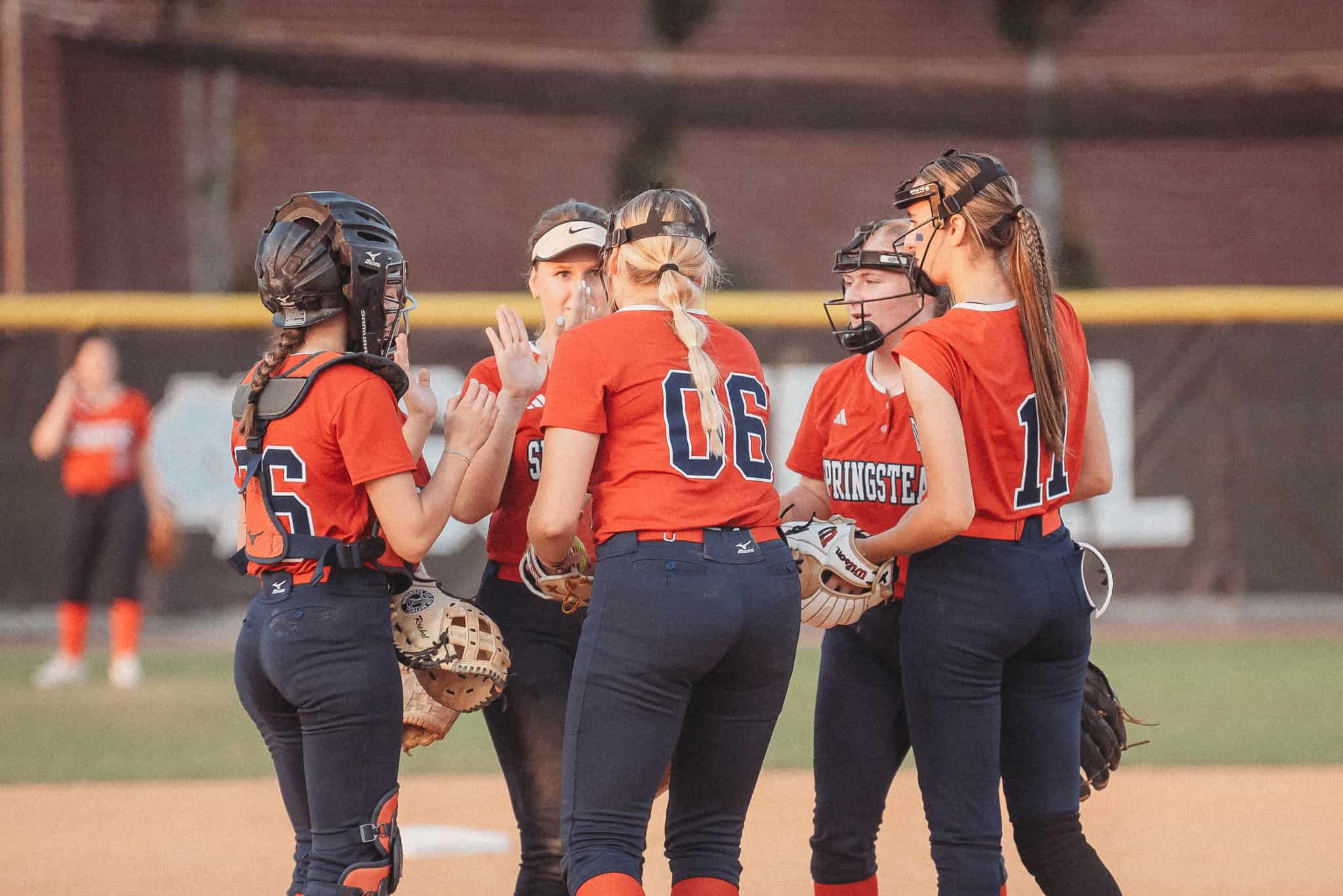 Springstead players convene on the mound. [Photo by Cynthia Leota]