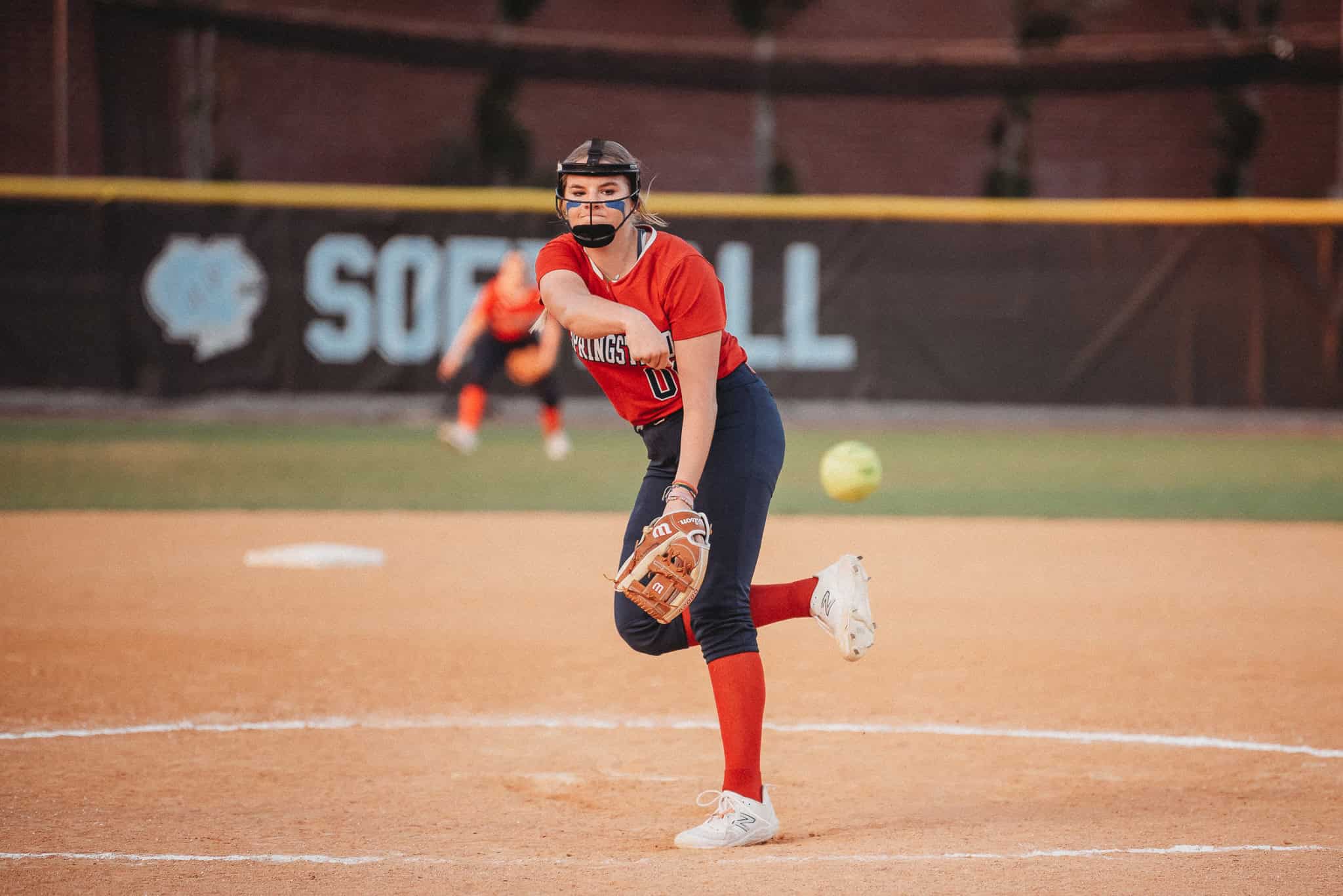 Alivia Miller winds up a pitch against Nature Coast player. [Photo by Cynthia Leota]