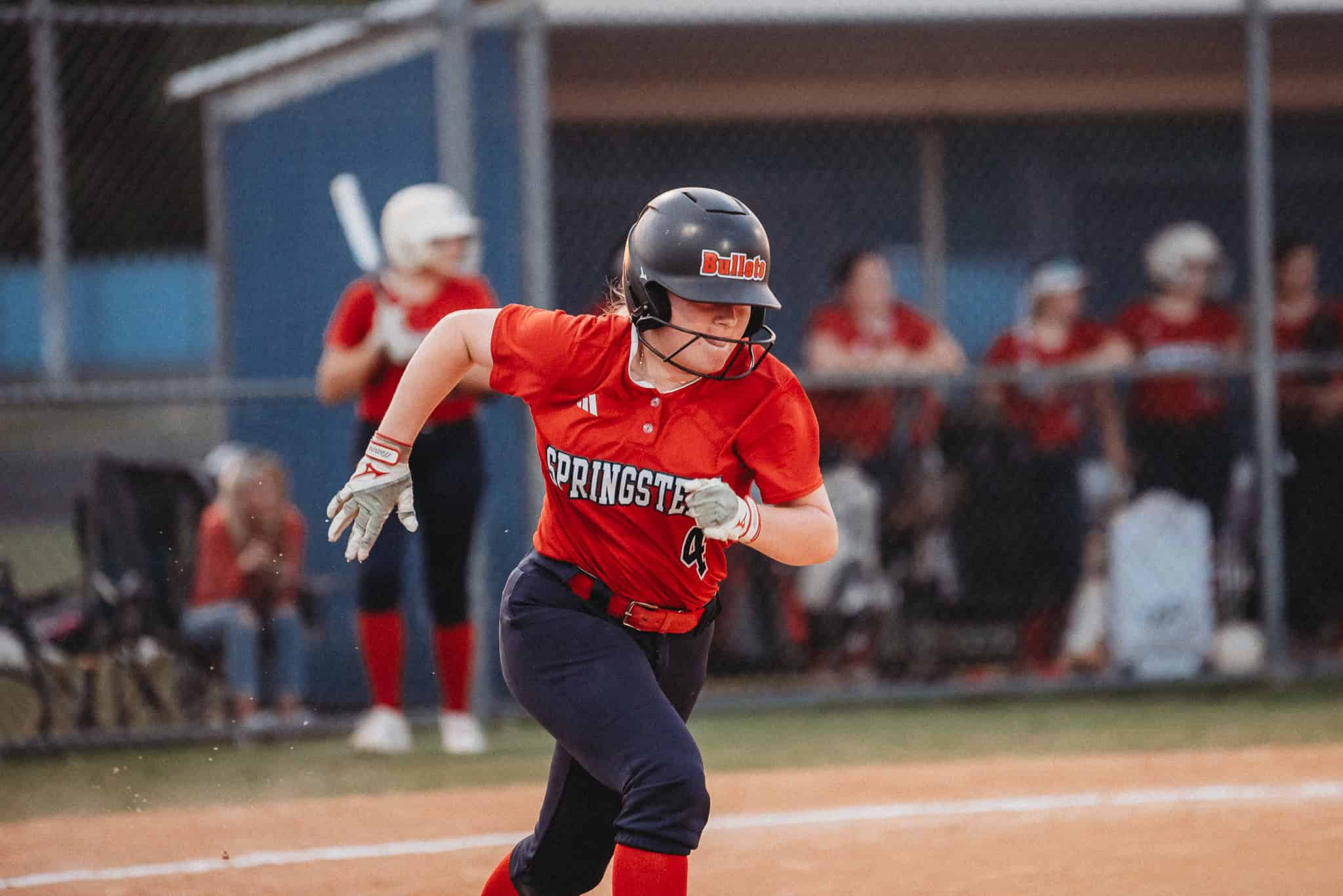 Liberty Savarese (SR) sprints to first base. [Photo by Cynthia Leota]