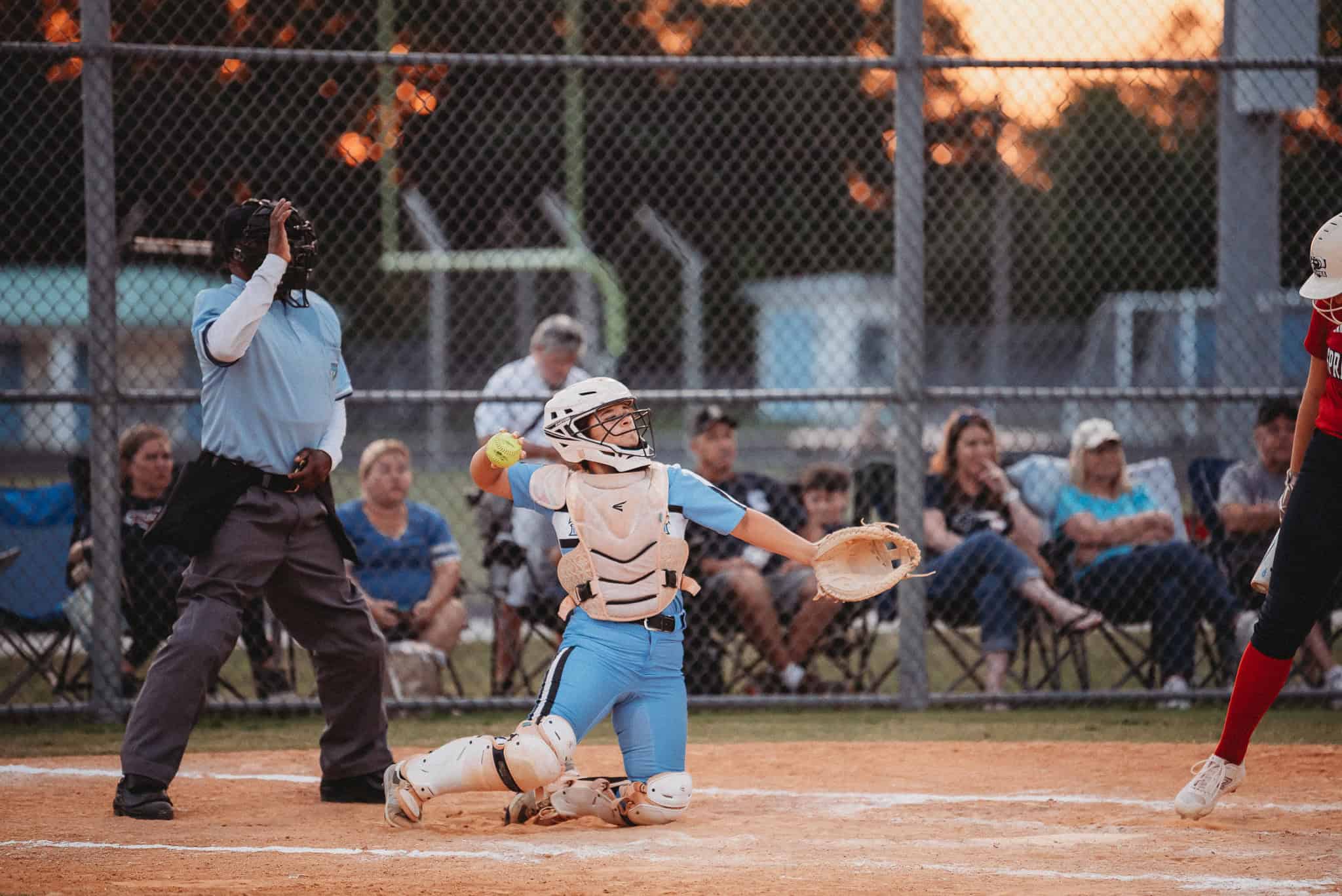 Gianni Villari (SR) catcher for Nature Coast throws the ball back to the pitcher. [Photo by Cynthia Leota]