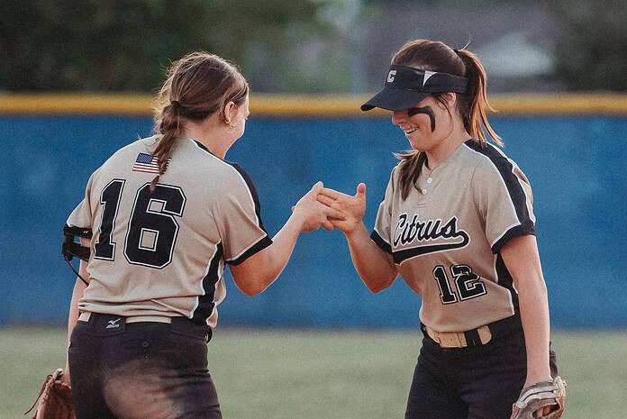 Makayla Anderson (L) and Riley Tirrell (R) of Citrus celebrate at Thursday's night's game against Springstead. [Photo by Cynthia Leota]