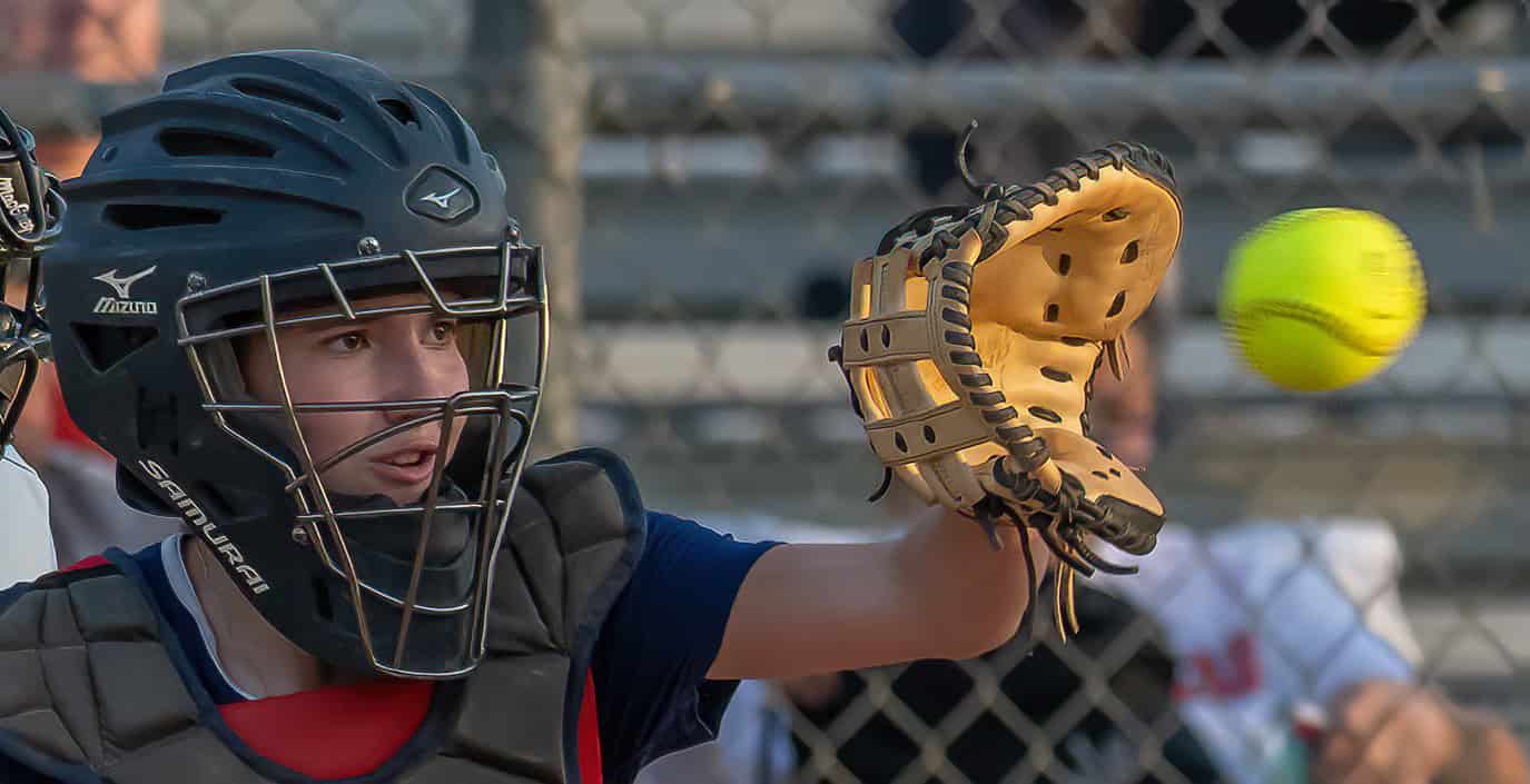 ABOVE: Springstead High’s catcher, Rachel Riviera looks a pitch into her glove during the game versus visiting Hernando High Tuesday evening. [Photo by Joe DiCristofalo]
