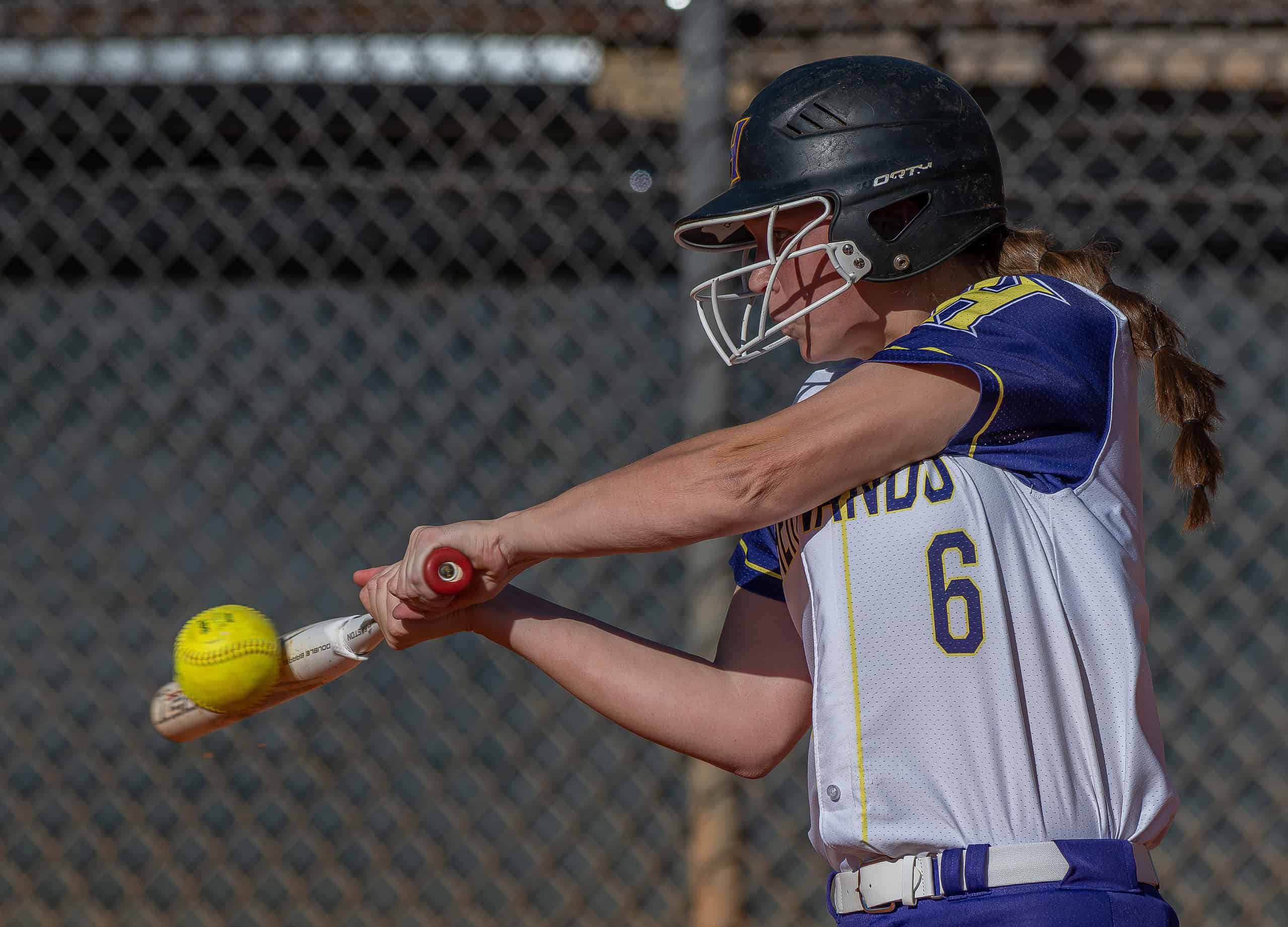 Hernando High’s Ava Braswell makes contact in the game versus Venice High during the Leopard Slam tournament at Tom Varn Park. [Photo by Joe DiCristofalo]