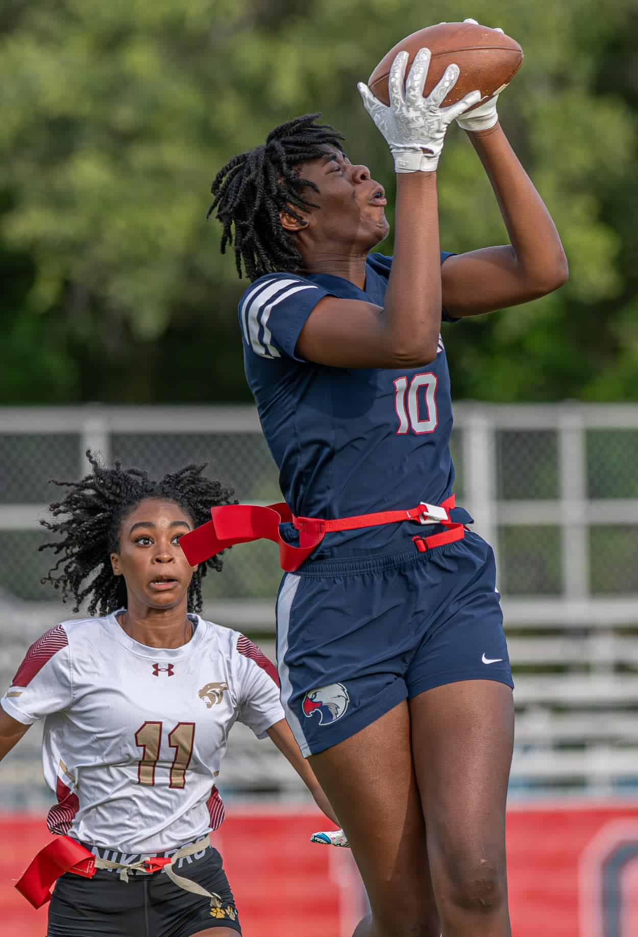 Springstead High, 10, Malanie Francis leaps for a reception during the Eagles 36-0 win at home in the 2A District 14 playoff match. Photo by [Joseph Dicristofalo]