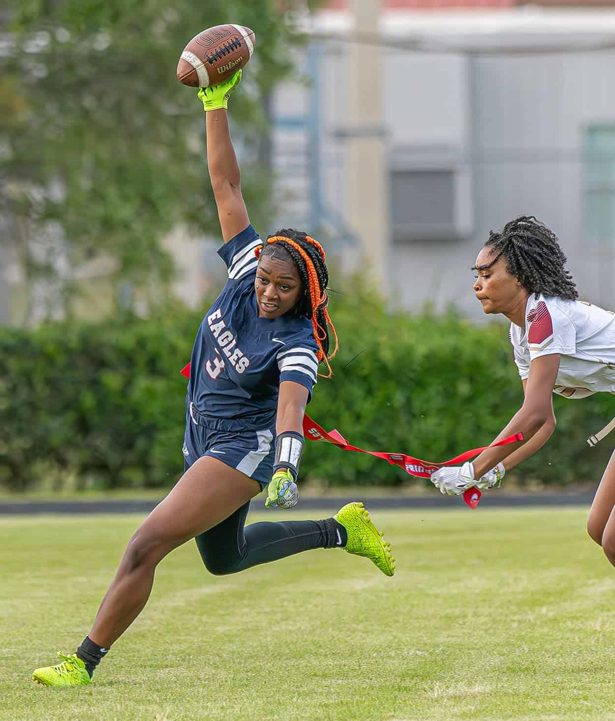 Springstead High, 3, Tija Holland stretches for extra yardage before having her flag pulled by a Countryside defender during the Eagles 36-0 win at home in the 2A District 14 playoff match. Photo by [Joseph Dicristofalo]