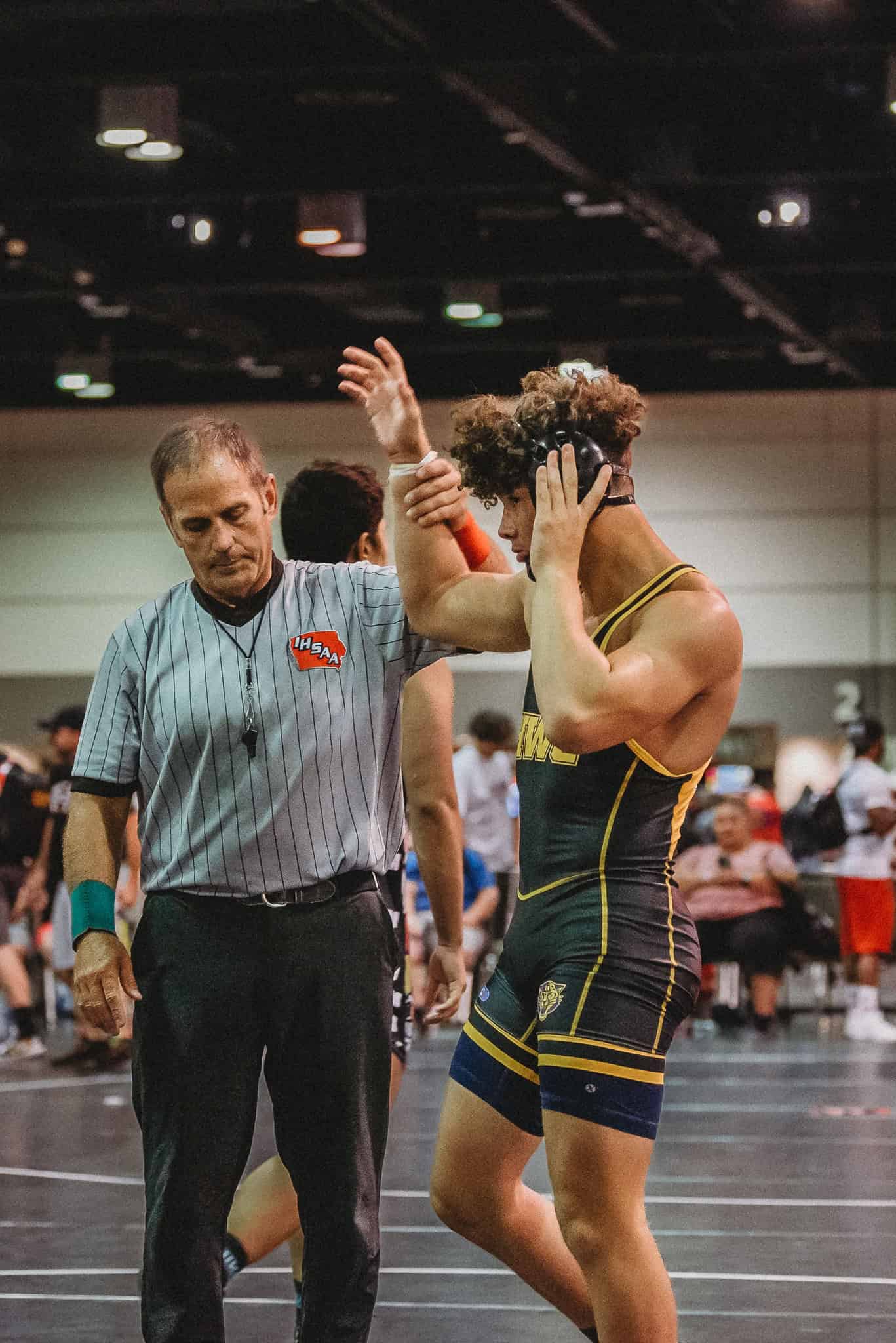 National Champion Jeremiah Chavis gets his hand raised. [Photo by Cynthia Leota]