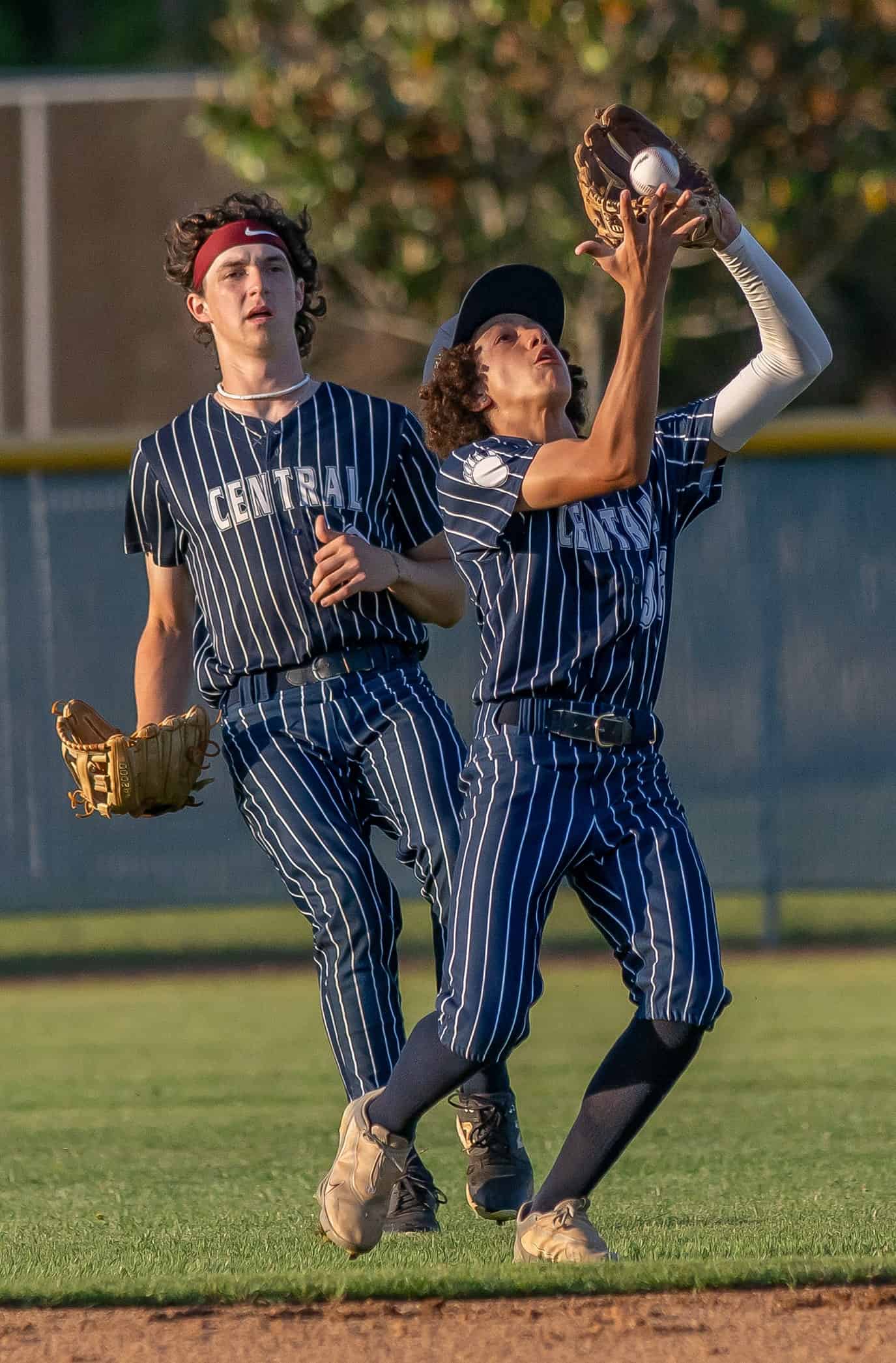 Central High second baseman, 36, Jacob Lugo makes sure of a catch in the first inning of the game against visiting Hernando High Friday.  Photo by [Joseph Dicristofalo]