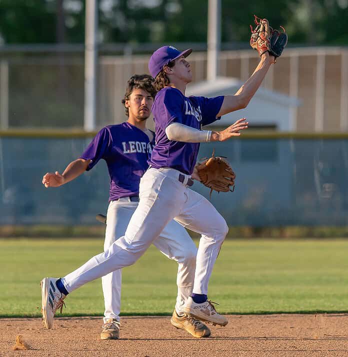 Hernando High shortstop, Austin Knierim crossed in front of second baseman Mason Morgan to snare a Central High line drive Friday in Brooksville. Photo by [Joseph Dicristofalo]