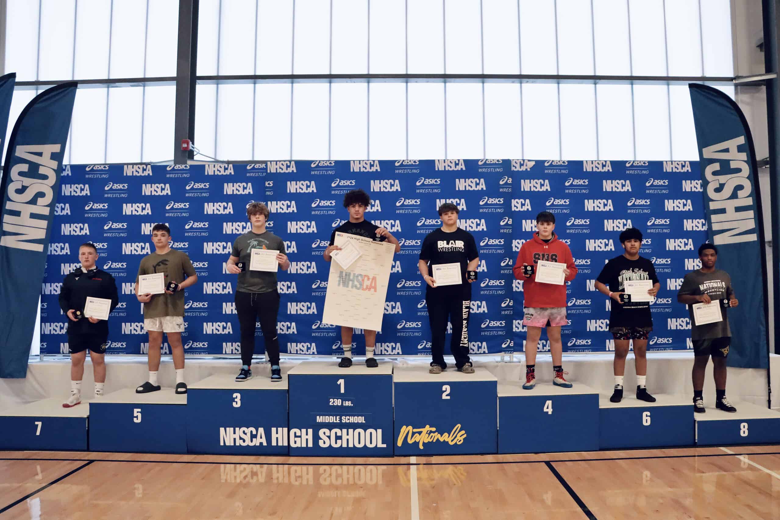 National Champion Jeremiah Chavis stands atop the podium at NHSCA Middle School Nationals. (Photo Courtesy of NHSCA)